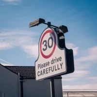 Please drive carefully roadsign