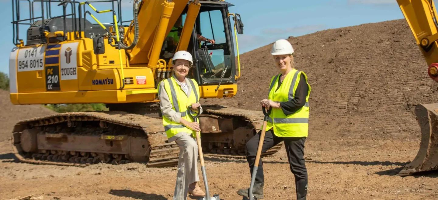 Councillor Marie McGurk and McTaggart MD Janice Russell on site of new council houses being built in Gallowhill