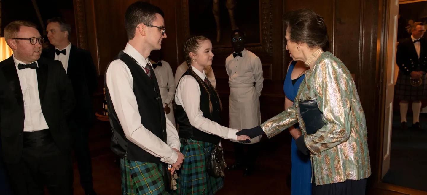 Kaitlyn McCurday shakes hands with HRH The Princess Royal