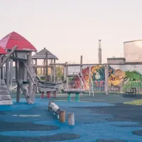 Photo of Lochwinnoch playground featuring climbing frames and slides.
